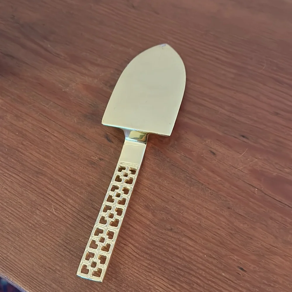 Jonathan Adler Nixon brass cake knife